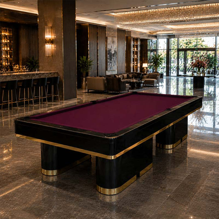 Koralturk Trapeza Pool Table featuring purple cloth, a high-gloss black frame and elegant gold accents in a luxury hotel lounge.