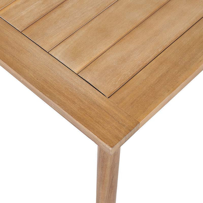 Corner detail of the Larissa Outdoor Corner Seating Set's coffee table, focusing on the precise joinery and durable wood.