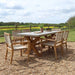 Angled view of the Luna 6 Seater Rectangular Concrete Dining Set, showcasing the stylish design of the rope stacking chairs and sturdy concrete table.