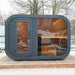 Front view of the Viking Industrier Luna Outdoor Sauna with Changing Room with glass door and window.