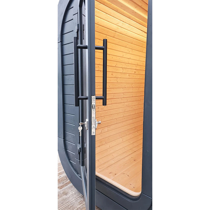 Close up view of Luna Outdoor Sauna open glass door. 