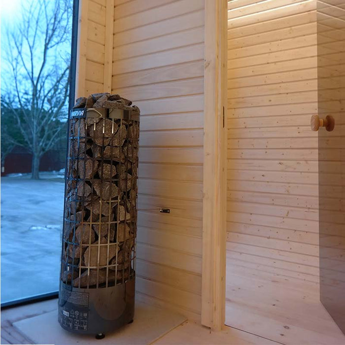 Harvia Heater positioned in front of the window in the Luna Outdoor Sauna. 