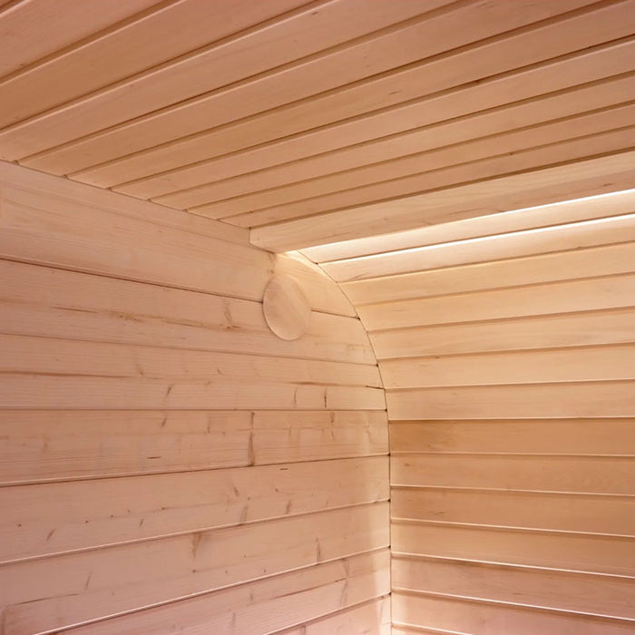 Close up view of the Luna Sauna's wooden ceiling with lighting.