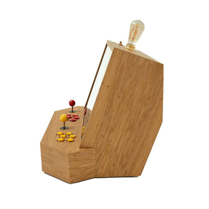 Side view of the Maison Roshi Sensei V1 arcade cabinet showcasing the sleek wooden finish, vintage bulb detail, and colourful control buttons and joysticks.