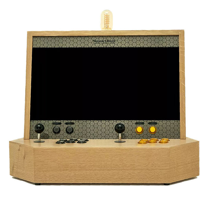 Front view of Maison Roshi Sensei V2 arcade cabinet with dual black joysticks and classic yellow buttons, showcasing its hexagonal patterned front panel.