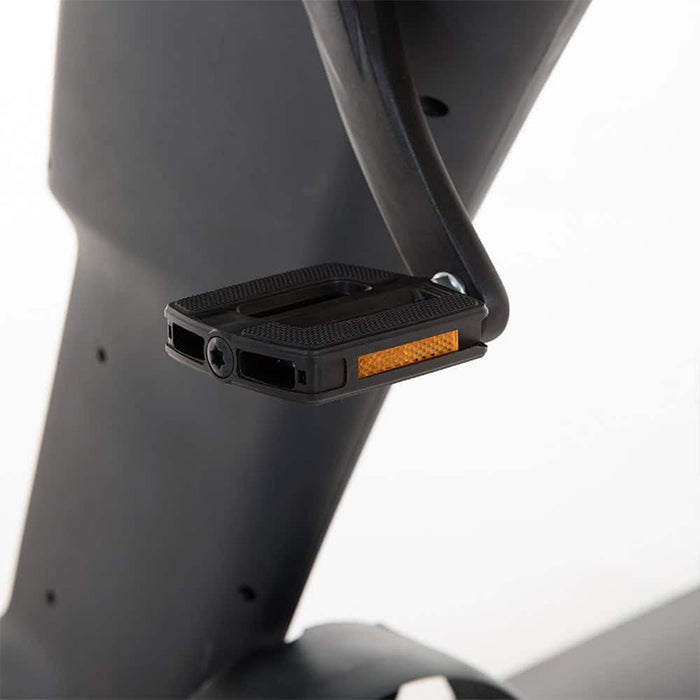 Manta5 Hydrofoiler SL3 Hydrofoil Bike black pedal with orange reflector close-up.