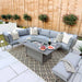 Elegant Mayfair Outdoor Lounge Set featuring a cosy corner seating arrangement and a stylish fire pit table.