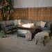 Evening lifestyle setting of the Mayfair Lounge Set with Fire Pit, creating a warm, inviting atmosphere.