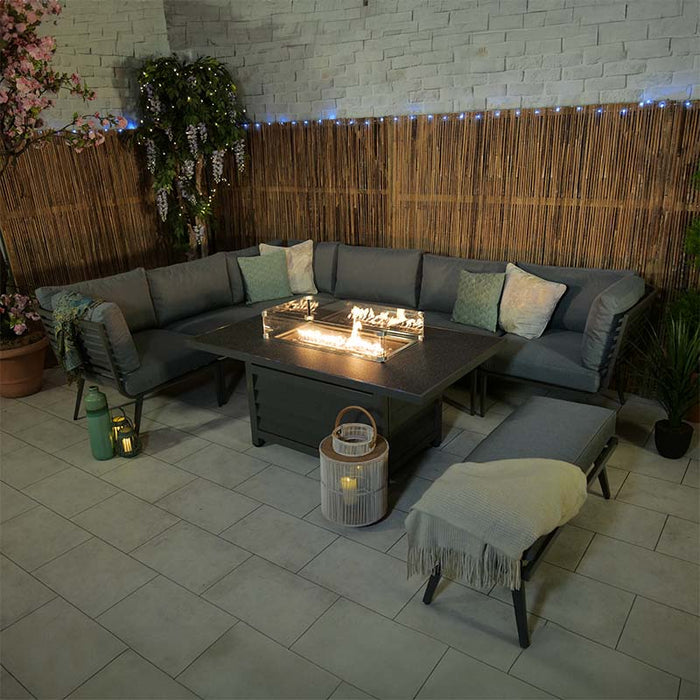 Inviting night-time scene with the Mayfair Lounge Set, featuring a modern fire pit table.