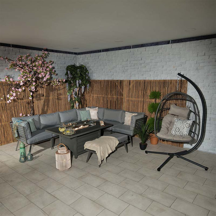 Complete view of the Mayfair Corner Lounge Set with Fire Pit and hanging chair, creating a stylish indoor garden space.