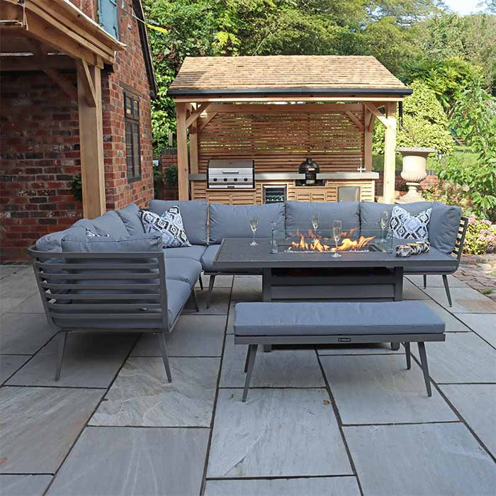 Stylish corner lounge set featuring a central fire pit table and comfortable bench seating.