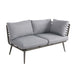 A side-angle view of the Mayfair Corner Lounge Set's sofa, featuring plush grey cushions and a modern metal frame, perfect for stylish outdoor relaxation.