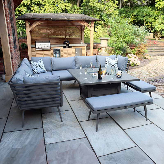 This elegant Mayfair Corner Sofa includes a fire pit table and two benches, designed to create a cosy garden seating area.