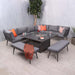 The Mayfair Corner Lounge Set with Fire Pit Table & 2 Benches arranged in a stylish indoor space, accented with vibrant orange cushions, offering a modern and cosy seating area.