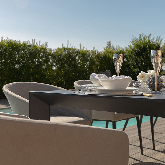 Ambition 10 seater extending dining set in oatmeal, featuring a close-up of the sleek, modern table edge.