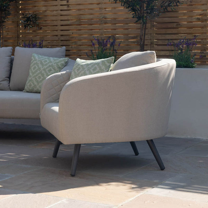 Side view of the armchair from the Ambition 3 Seater Sofa Set in oatmeal, illustrating its plush cushioning and modern design.