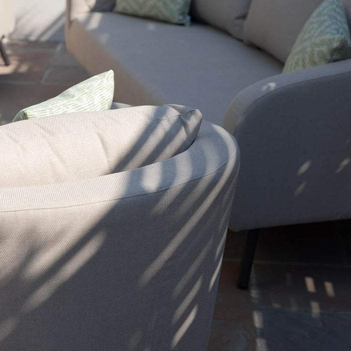 Close-up view of the armrest of the Ambition 3 Seater Sofa in oatmeal fabric, highlighting the soft cushioning and premium fabric.