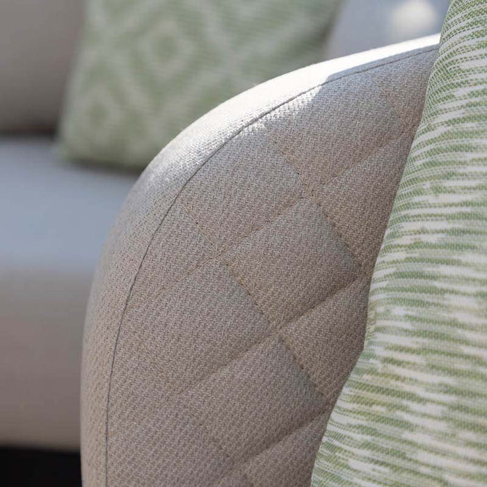 Close-up shot of the cushion details on the Ambition 3 Seater Sofa in oatmeal fabric, showcasing its soft quilted design.