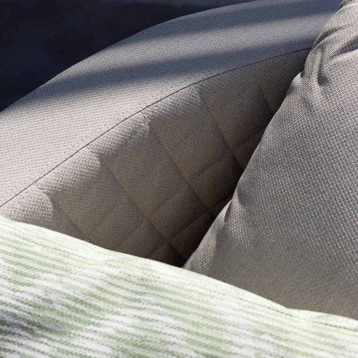 Detailed image of the quilted cushion of the Ambition 3 Seater Sofa in oatmeal, showcasing its texture and comfort.