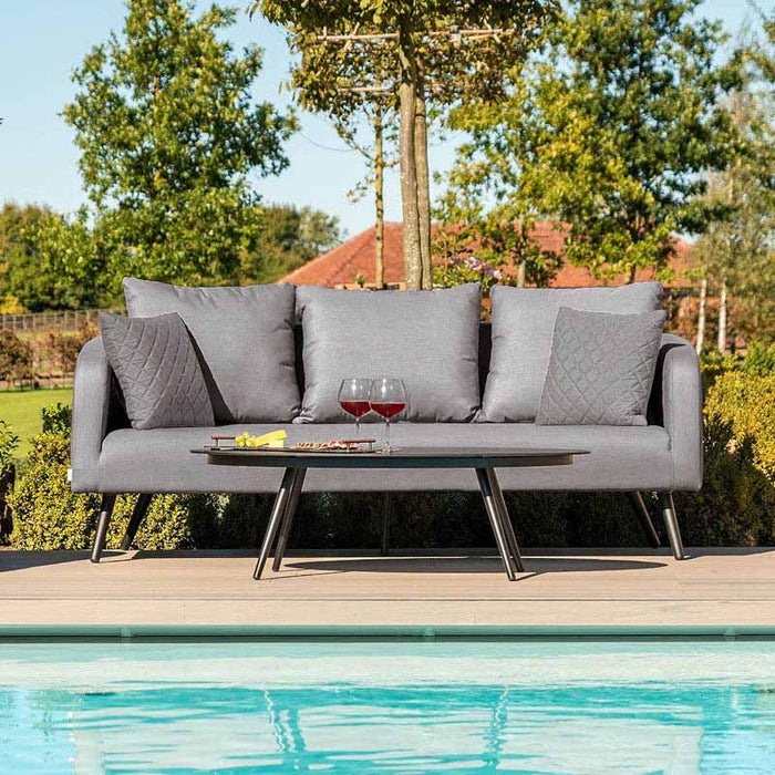 Close-up view of the Ambition 3 Seater Sofa Set in Flanelle, set by the pool, showcasing the modern design and plush cushions.