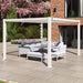 Side view of the Como Aluminium Outdoor Garden Pergola in white, perfectly framing a spacious outdoor seating arrangement.