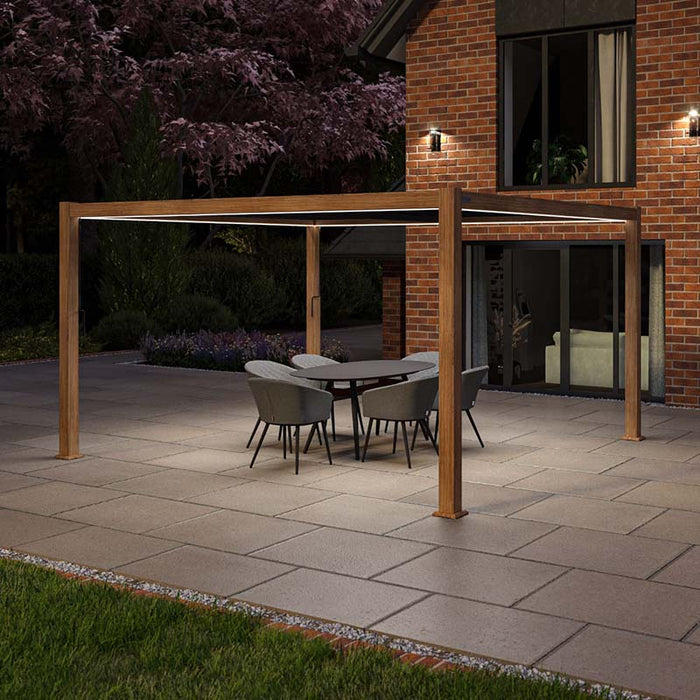 Maze Como Pergola 4m x 4m in Wood Effect with LED lighting, perfect for creating a cozy atmosphere in your garden at night.