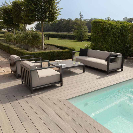 Full view of the Maze Ibiza 3 Seater Sofa Set with Square Table, featuring the 3-seater sofa, two armchairs, and a modern square coffee table in an outdoor setting.