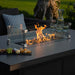 Close-up of the glowing fire pit in the Pulse 3 Seater Sofa Dining Set, perfect for evening outdoor gatherings.