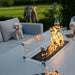 Flames in action on the Pulse 3 Seater Sofa Dining Set with Fire Pit, offering a warm and inviting outdoor dining experience.