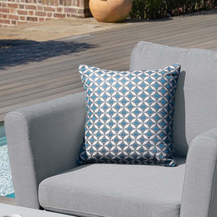 Lead Chine sofa cushion with geometric patterned pillow, part of the Maze Pulse 3 Seater Dining Set.