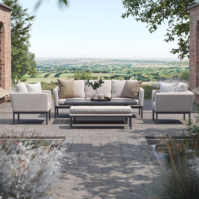 Pulse 3 Seater Sofa Dining Set with rising table, oatmeal fabric, offering a serene garden view.