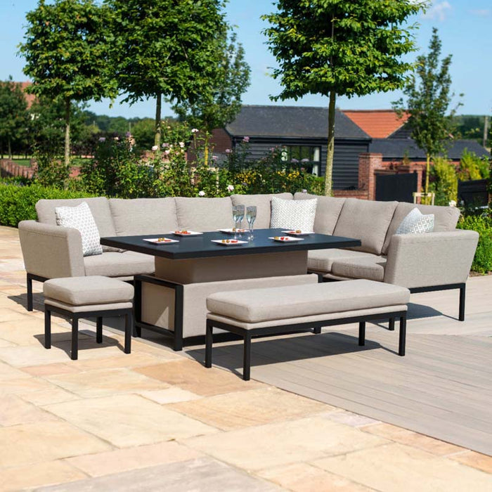 A stylish outdoor setup of the Pulse corner dining set in taupe with a rising table, ideal for modern outdoor living spaces, featuring ample seating for entertaining.