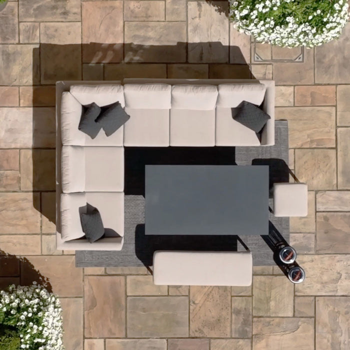 Birdseye view of the Pulse Rectangular Corner Dining Set with Rising Table in oatmeal, set in a stylish outdoor patio.