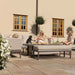 Family enjoying a relaxing afternoon in the garden with the Pulse Rectangular Corner Dining Set with Rising Table, in oatmeal. The comfortable corner sofa and adjustable table create a perfect outdoor setting for both lounging and dining.