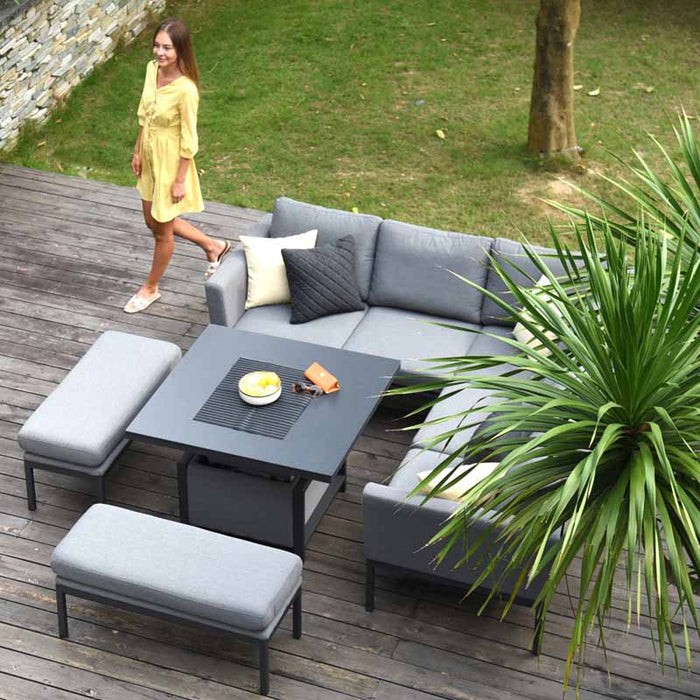 Top-angle shot of the Pulse Square Corner Dining Set with Rising Table in flanelle, showing the arrangement and accessories.