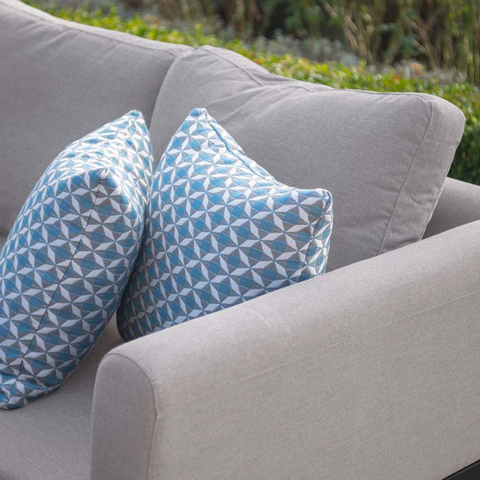 A close-up of the comfortable taupe cushions and patterned pillows on the Pulse U Shape Corner Dining Set, showcasing both style and comfort for outdoor lounging.