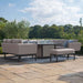 A low-angle shot of the Pulse U Shape Corner Dining Set in taupe, with a central fire pit, offering a modern and elegant outdoor seating arrangement.