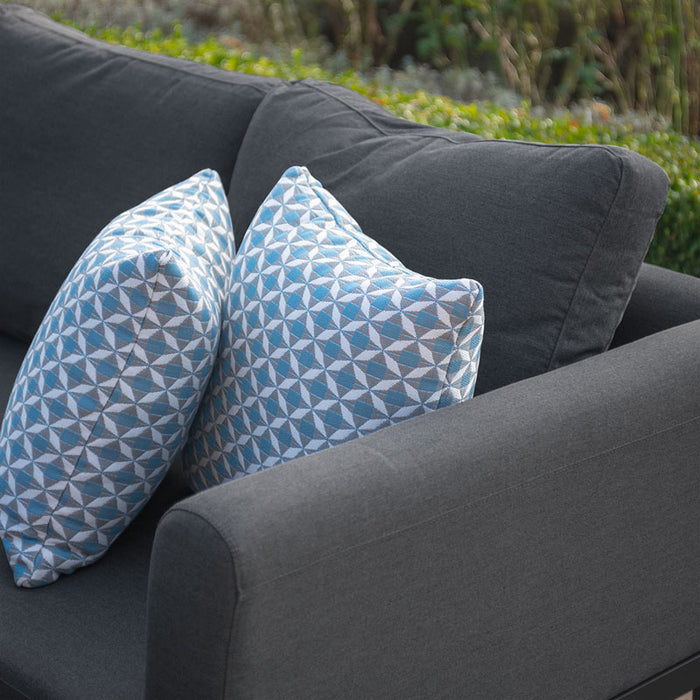 A focus on the decorative pillows and comfortable cushions of the Pulse U Shape Corner Dining Set, adding style and comfort to the outdoor setting.