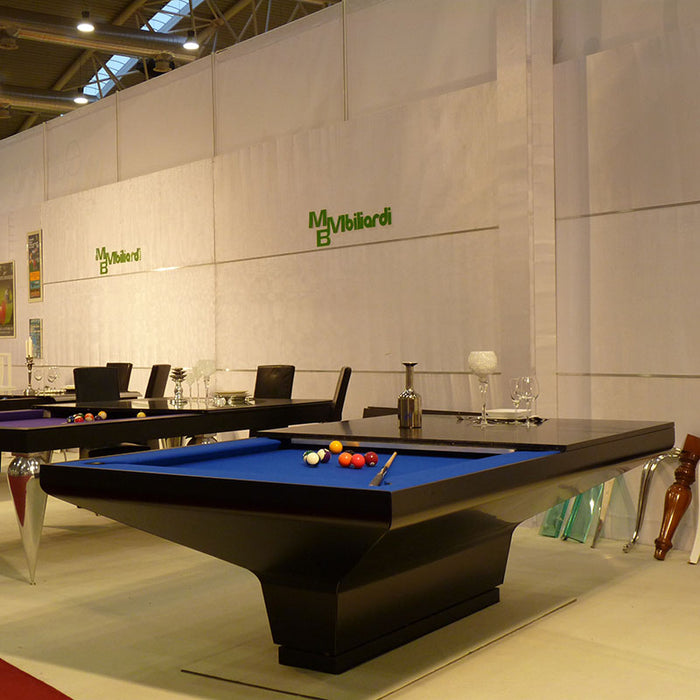 Multiple MBM Biliardi B_ig Pool Tables in black wood finish with bright blue felt tops displayed in a stylish showroom setting.