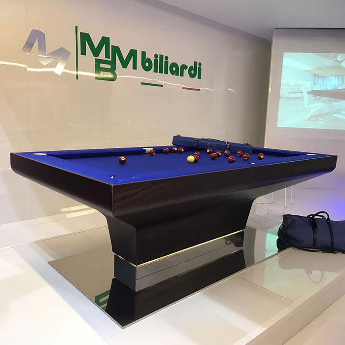 Stylish MBM Biliardi B_ig Pool Table with reflective base, navy blue felt, and rich wood finish for luxury entertainment spaces.