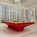 High-gloss red MBM Biliardi B_ig Pool Table with gold-toned felt, positioned in a lavish penthouse with floor-to-ceiling windows and a statement chandelier.