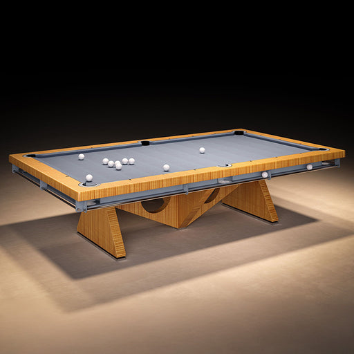 Angled perspective of the MBM Biliardi Dune designer pool table in light wood finish with grey felt top and sculptural triangular legs, combining style and function.