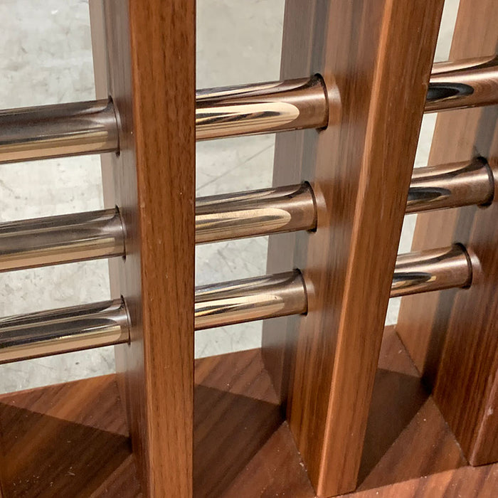 Detail of MBM Biliardi Kyoto billiard table base with polished chrome crossbars.