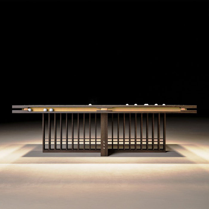 Side profile of MBM Biliardi Kyoto luxury billiard table with yellow cloth and modern base.