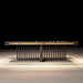 Side profile of MBM Biliardi Kyoto luxury billiard table with yellow cloth and modern base.