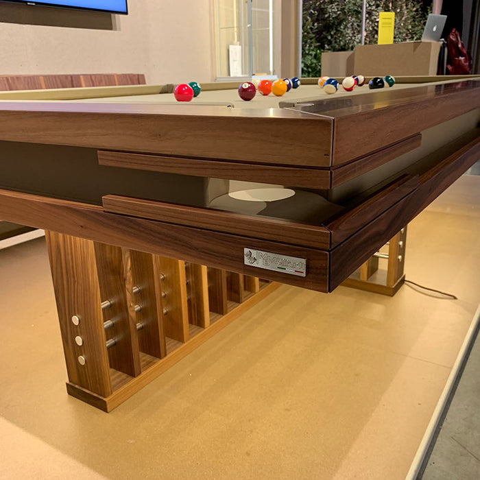 Detailed view of MBM Biliardi Kyoto luxury walnut billiard table frame and leg design.