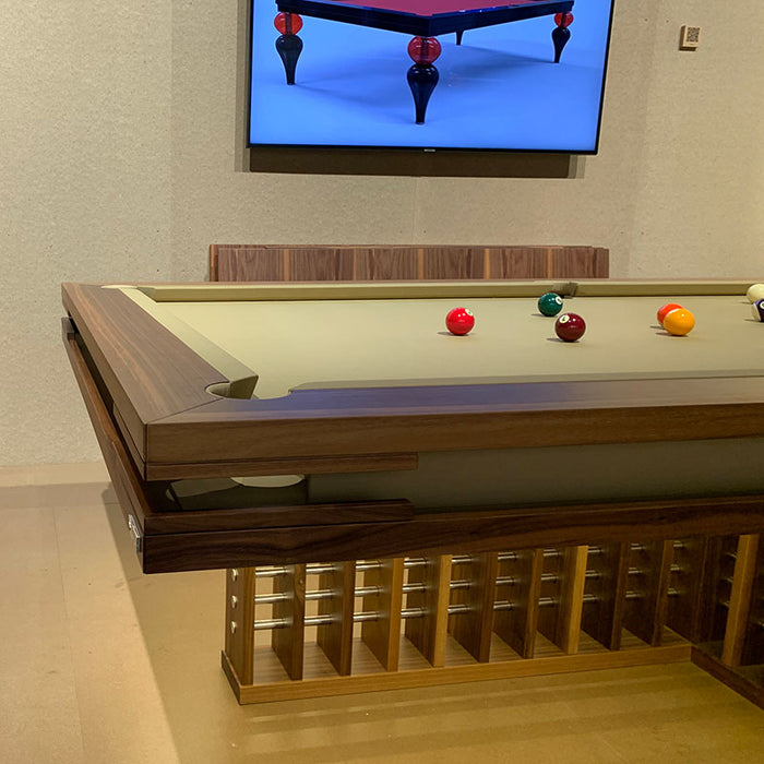 MBM Biliardi Kyoto luxury pool table in walnut finish with modern design, showcased at design exhibition.