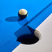 Close-up of MBM Biliardi Stealth pool table corner pocket with blue felt surface, featuring yellow-white and green-white billiard balls in play.