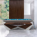MBM Biliardi Stealth pool table in luxury living room, white frame with rich dark wood panels and blue felt, contemporary high-end billiard table design.