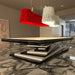 A modern MBM Biliardi Ziggurat pool table in black, white, and cream, displayed in a luxurious living space with contemporary art and unique lighting.